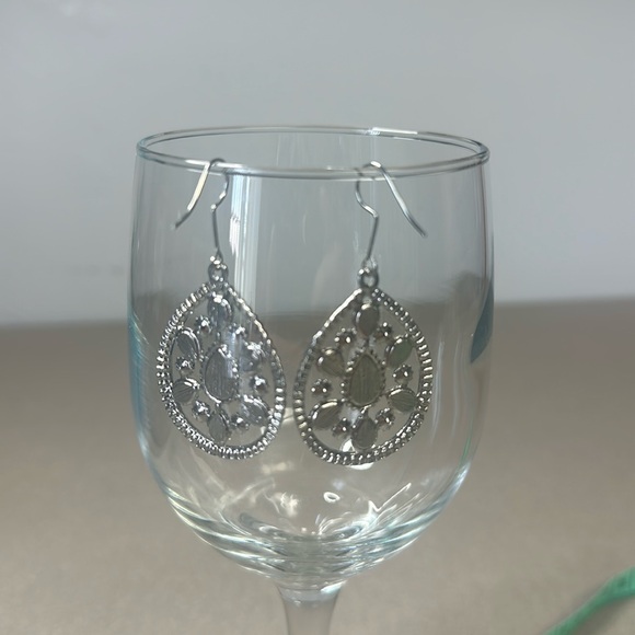 Silver metal and turquoise colored beads make these earrings stunning - Picture 2 of 4